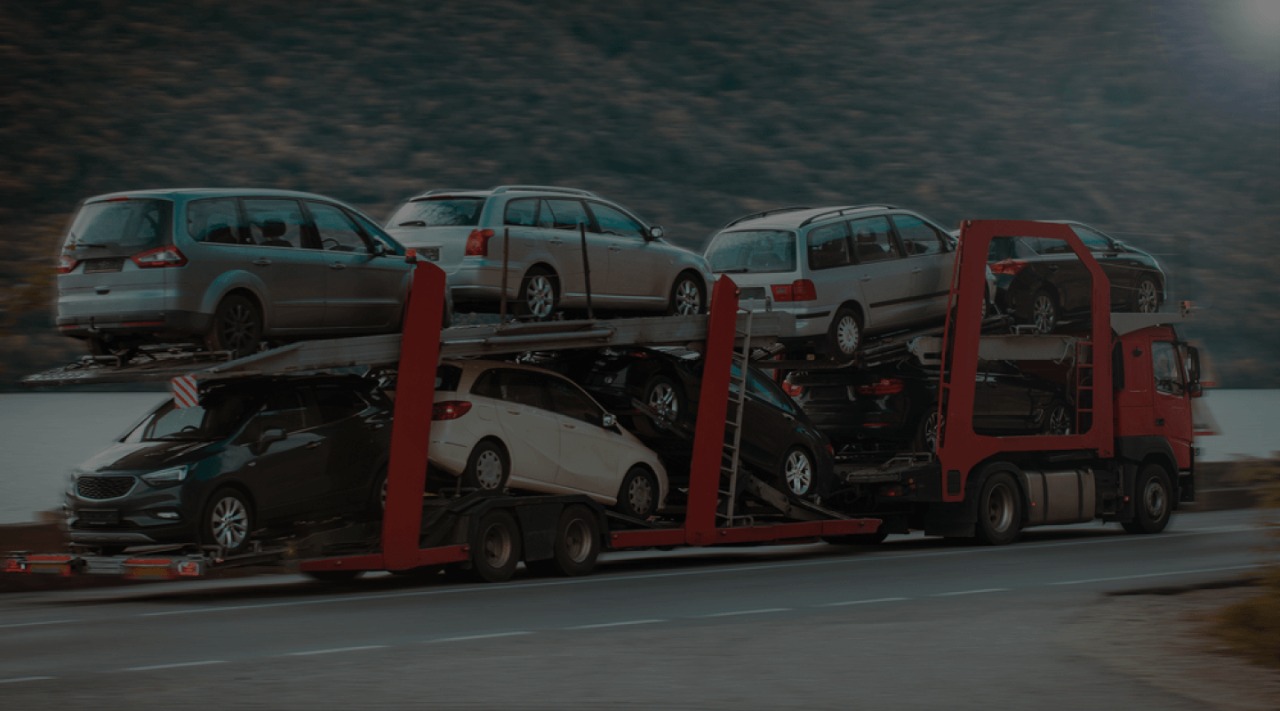 TRANSPORTING CARS TO DEALERSHIP 